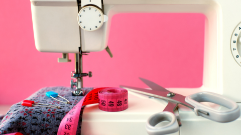 Sewing machine, fabric, measuring tape, and scissors